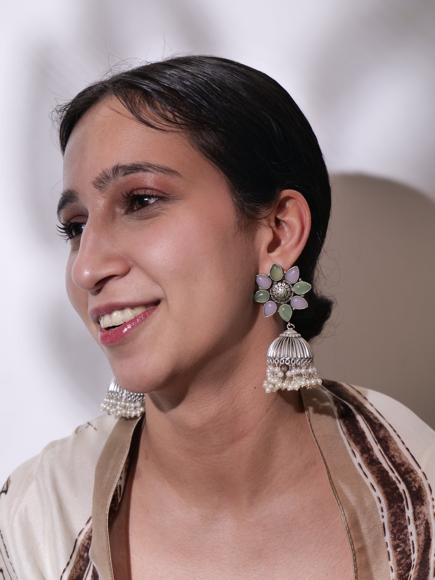 Silver jhumkis with stones