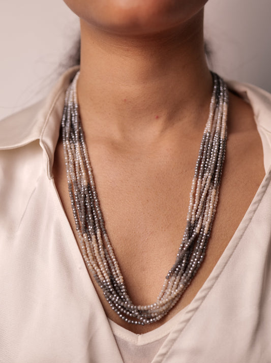 Grey and white multi string necklace