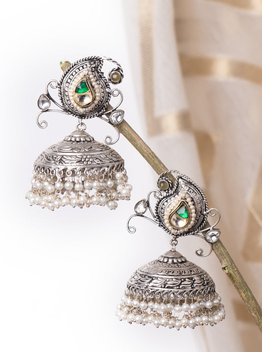 Silver jhumkis with green stones and pearls