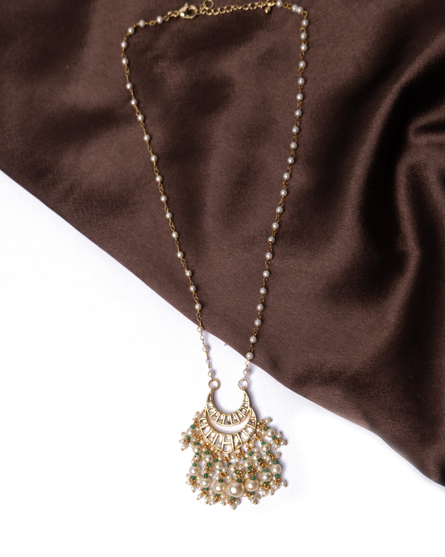 Kundan polki pendant with pearls