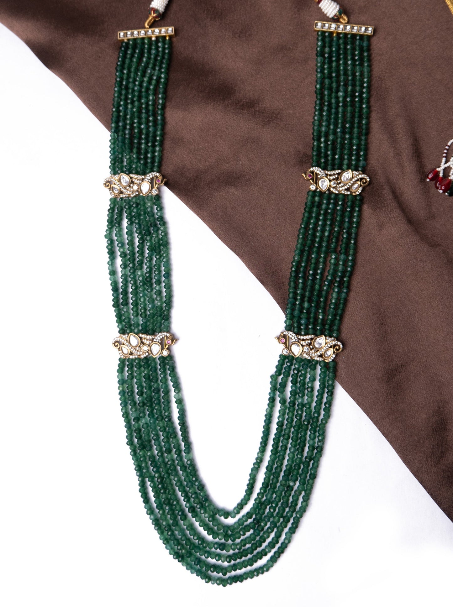Seven layer emerald grren necklace with polki motifs