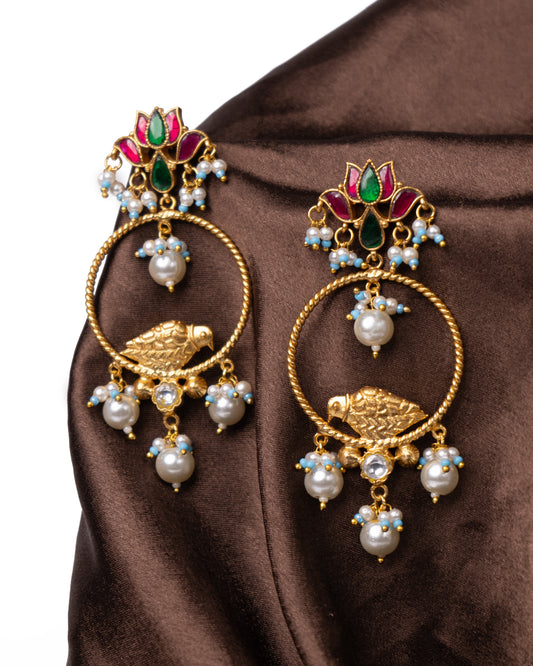 Golden bird earrings with lotus studs