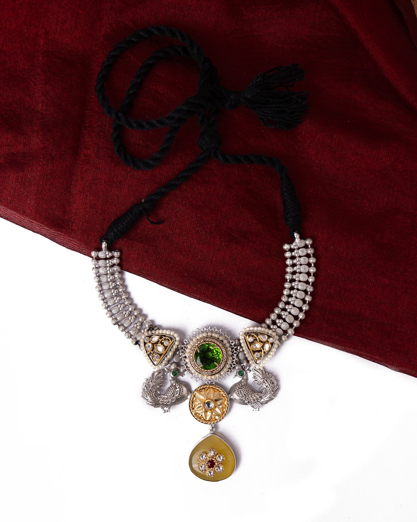 Choker with stones and peacock motifs