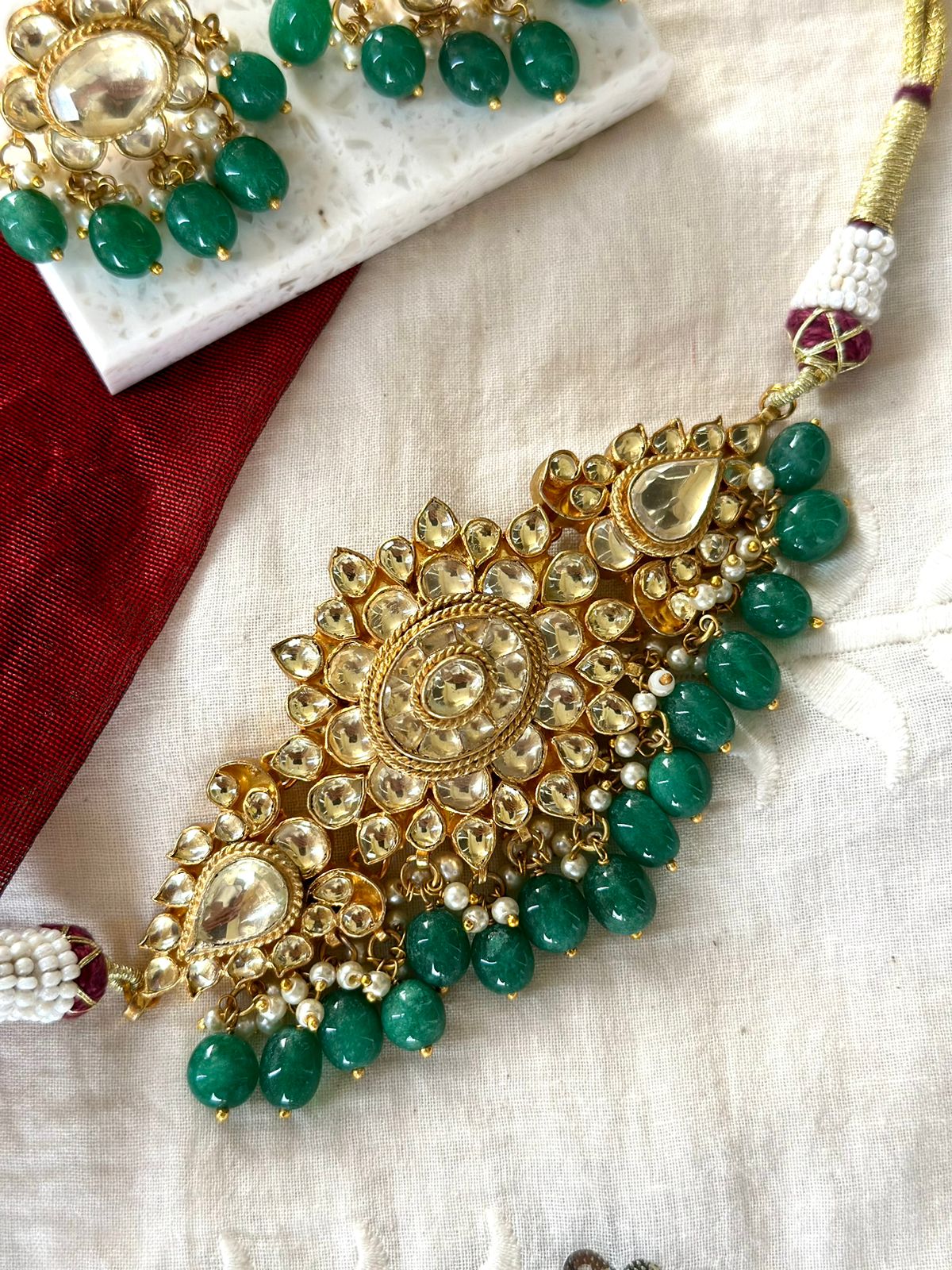 Kundan polki choker with green stones