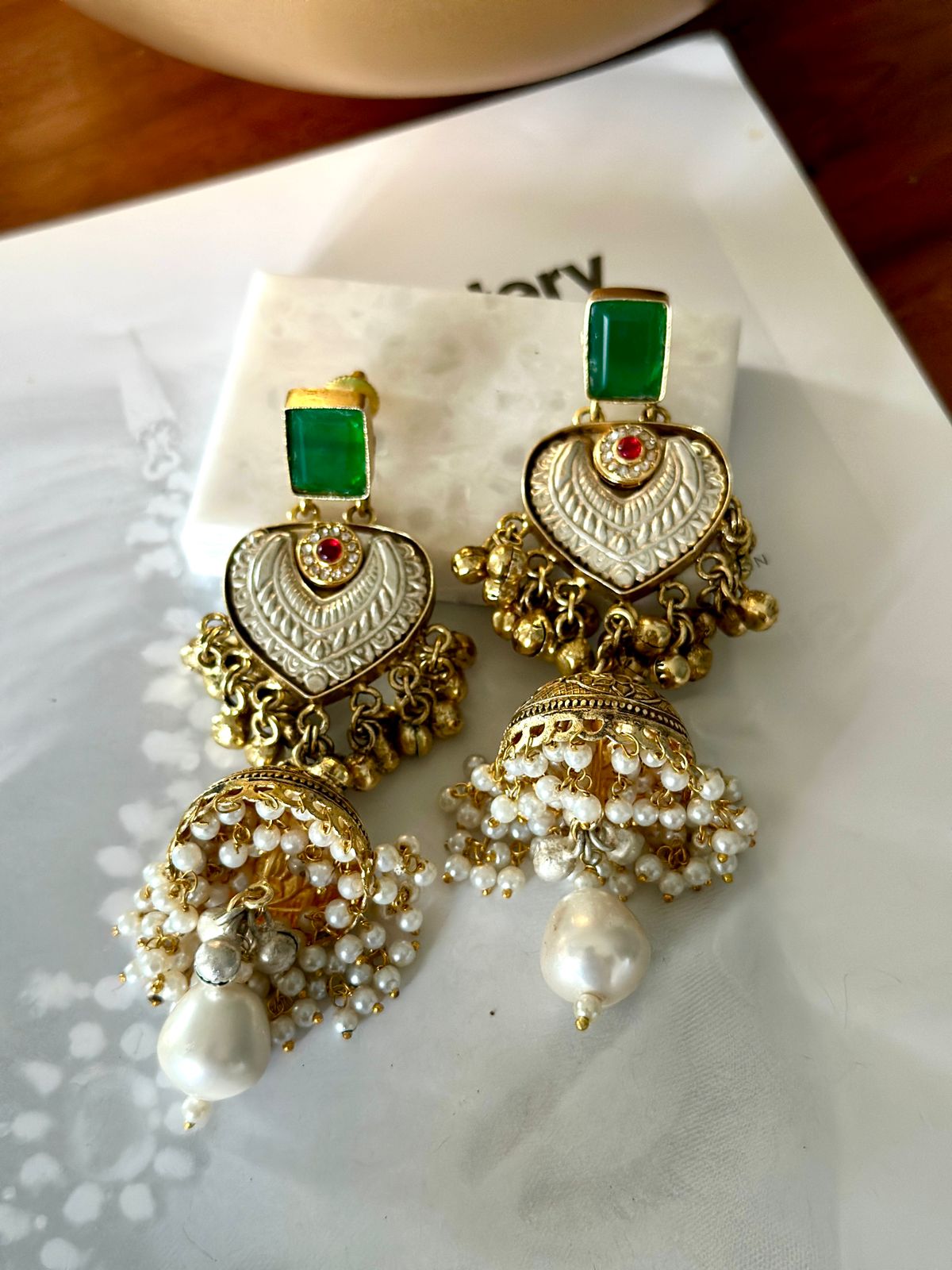 Dual tone jhumkis with stones