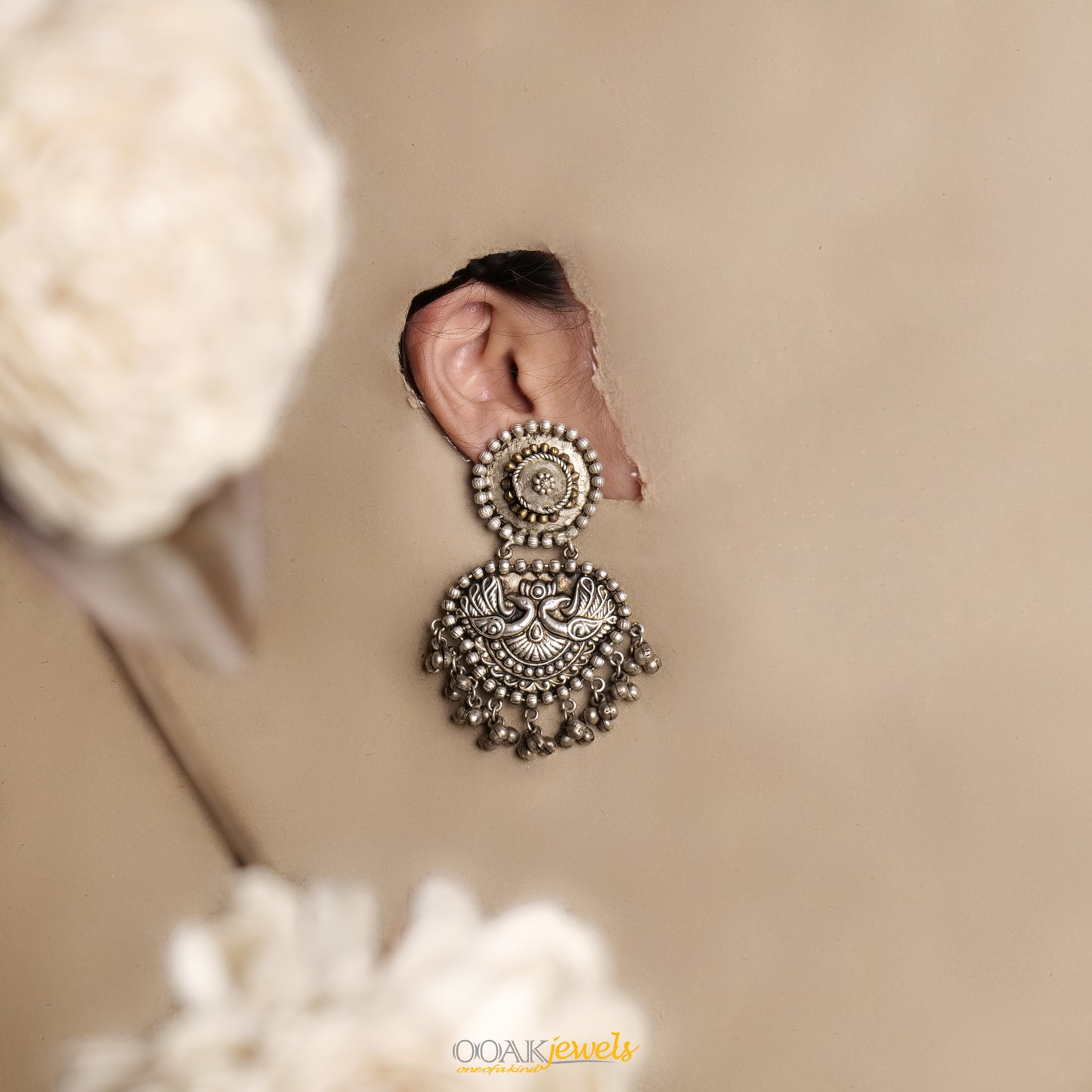 Silver tone tribal earrings