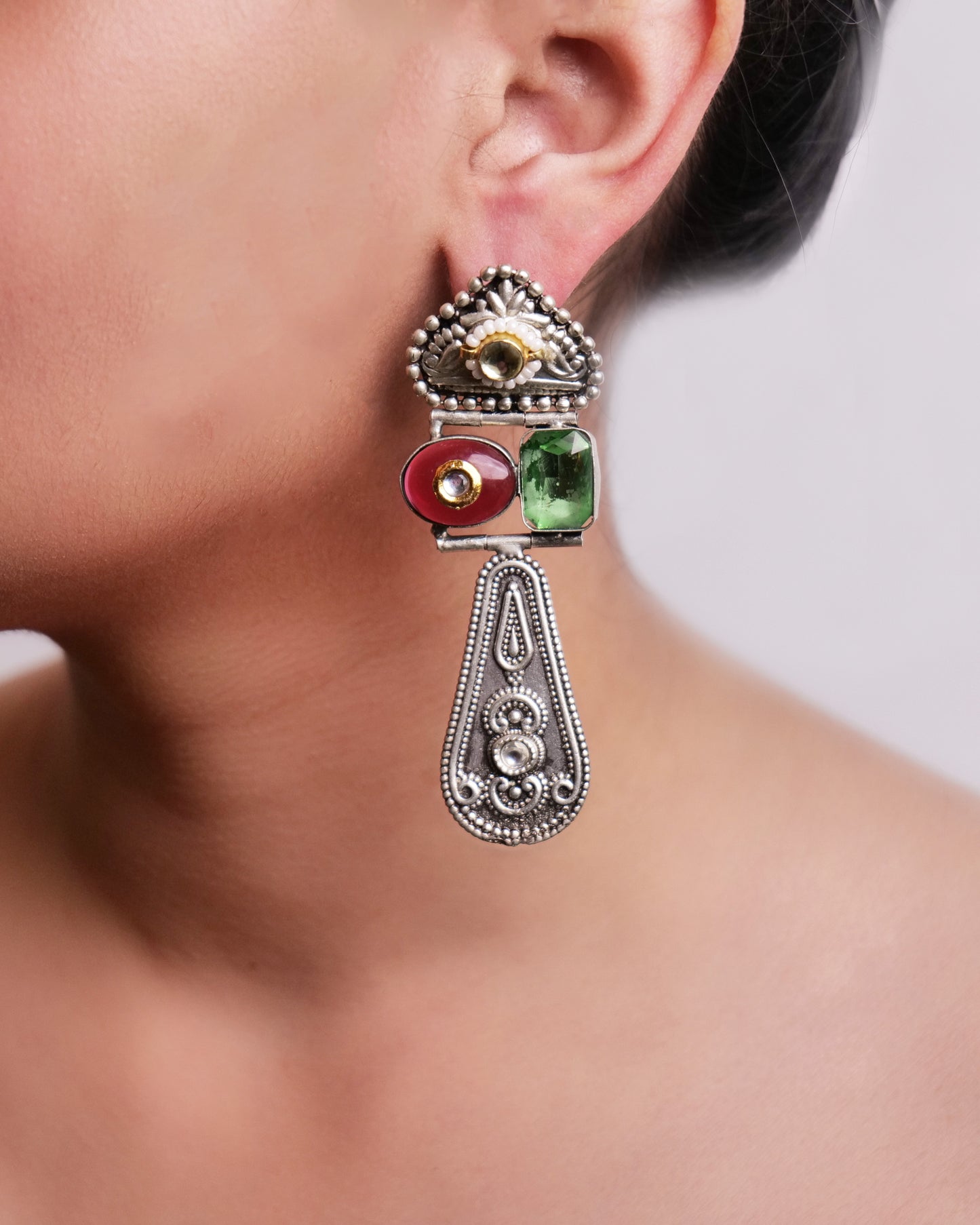 Silver beauties in red and green stones
