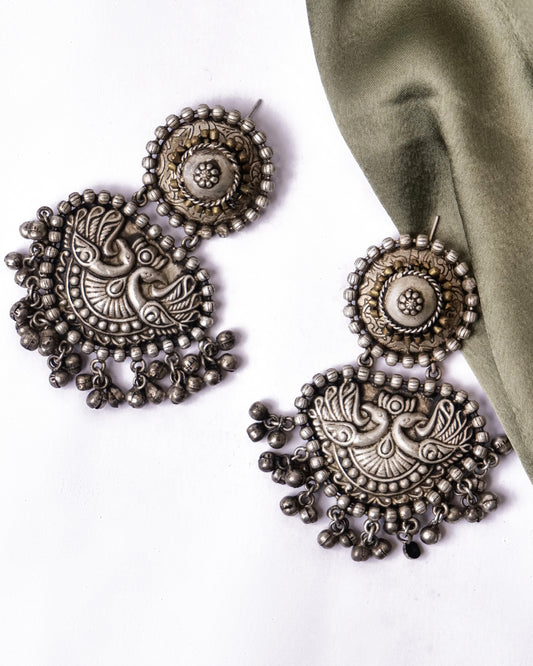 Silver tone tribal earrings